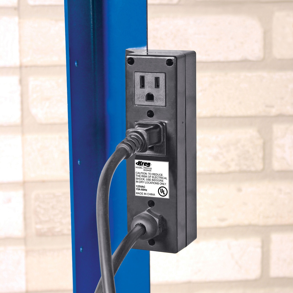 Kreg PRS3100 Multi-Purpose Router Table Switch mounted on a workstation with the dual outlets shown for powering two devices