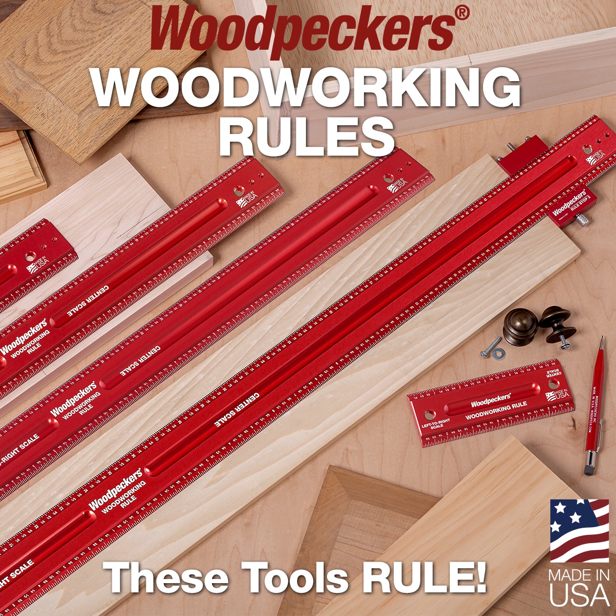 Woodpeckers WWR36 Woodworking Rule shown with other woodworking rules on a benchtop surrounded by wood parts for measuring and layout