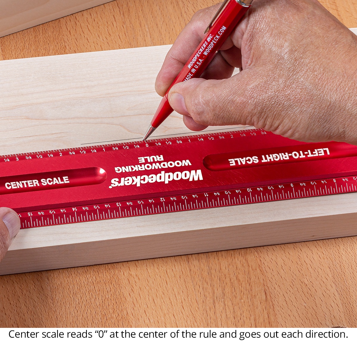 Woodpeckers WWR36 Woodworking Rule used on a wood board for center layout marking at a workbench