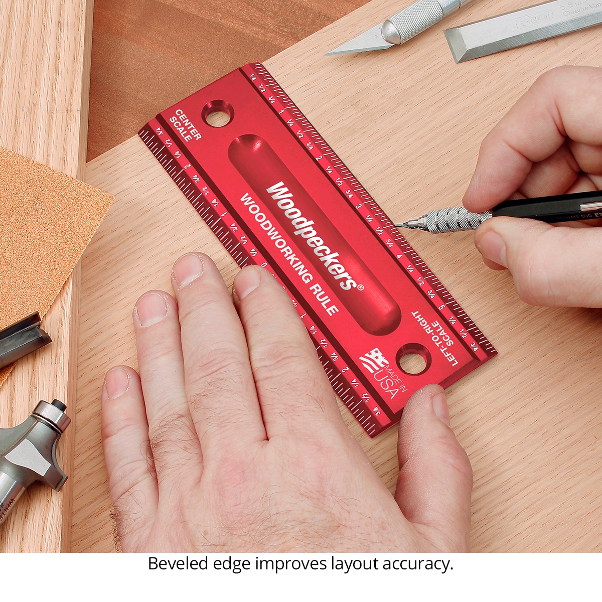Woodpeckers woodworking rule guiding a pencil line on a hardwood board with the beveled edge against the workpiece