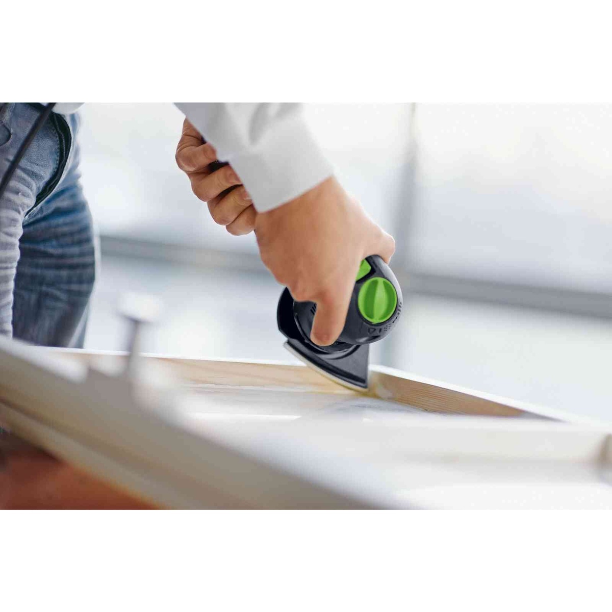 Festool 576263 RO 90 DX FEQ-Plus Rotex Sander using the delta pad to sand a painted wood edge and corner on a trim or furniture panel