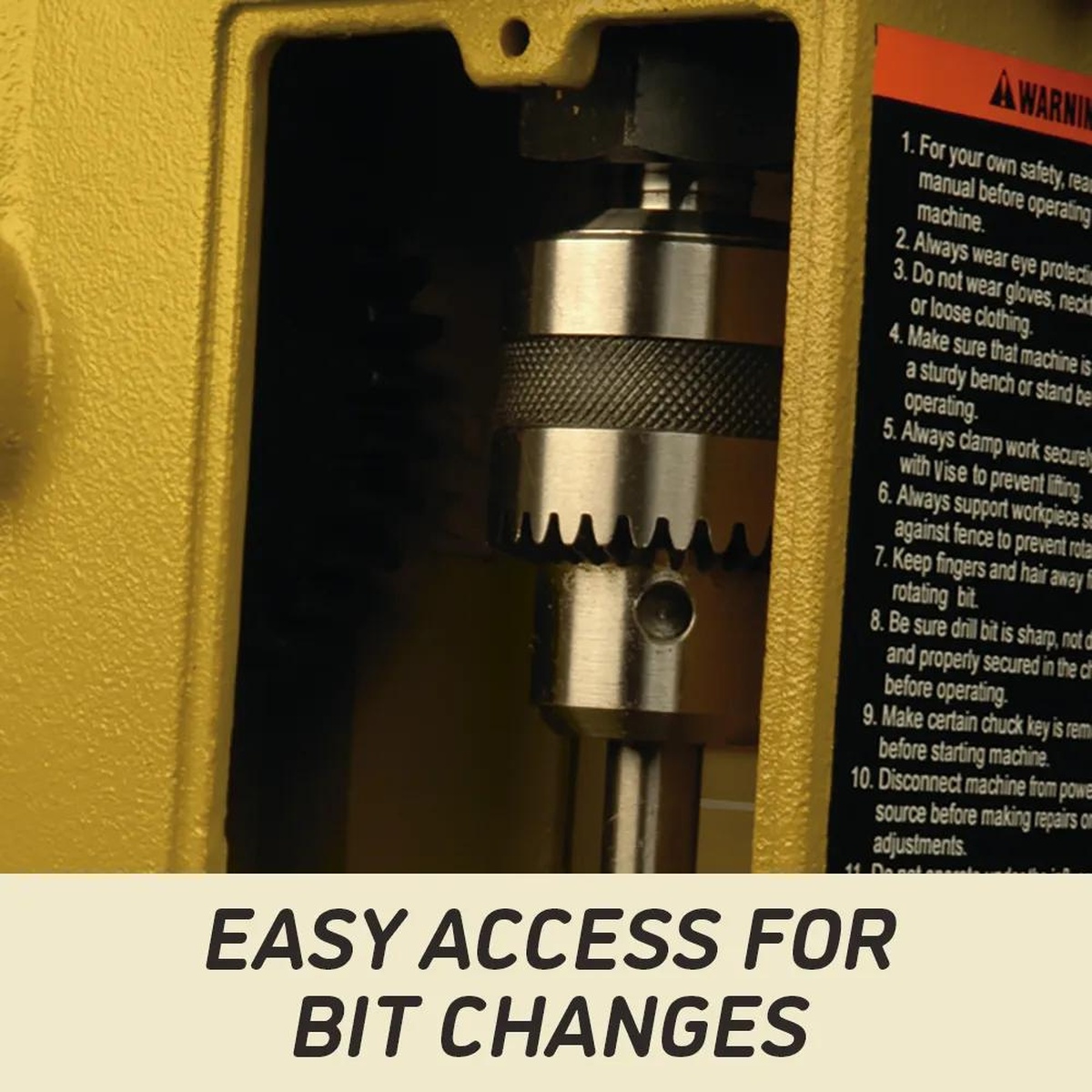 Powermatic 1791264K 719T Mortiser keyed chuck shown through access door for bit changes in a woodworking shop