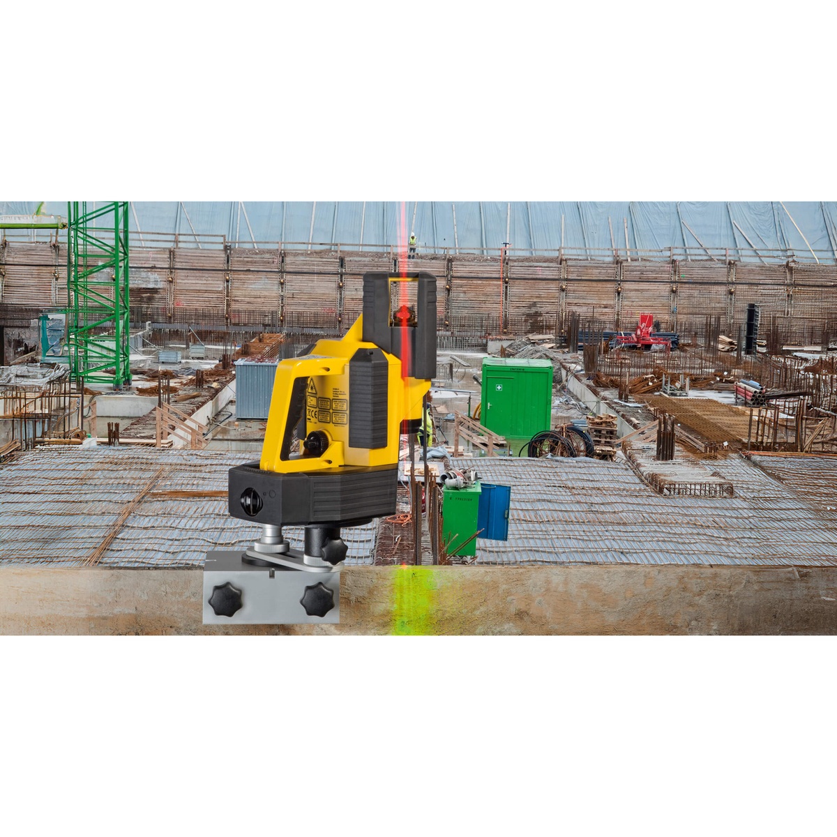 Stabila 02180 LA 180L Layout Laser Level Set mounted at a concrete edge on a construction site for long-range right-angle layout