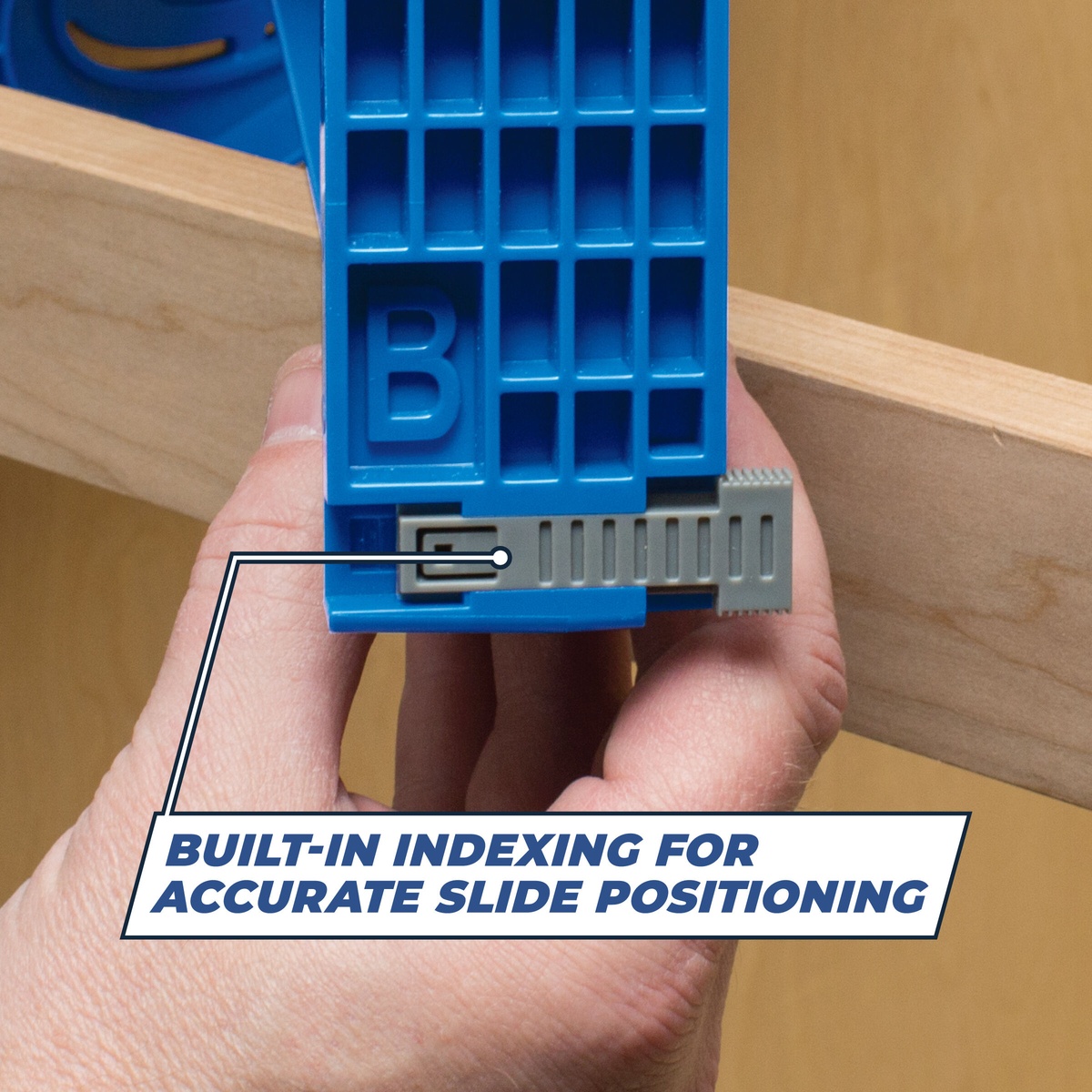 Kreg KHI-SLIDE Drawer Slide Jig indexing tab aligned to cabinet material for accurate drawer slide positioning