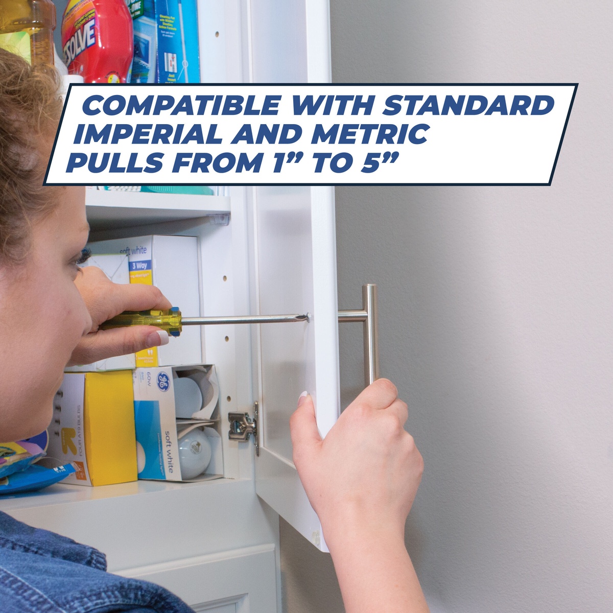 Kreg Tool Cabinet Hardware Jig (KHI-PULL) used to align and install a cabinet door pull on a white cabinet door