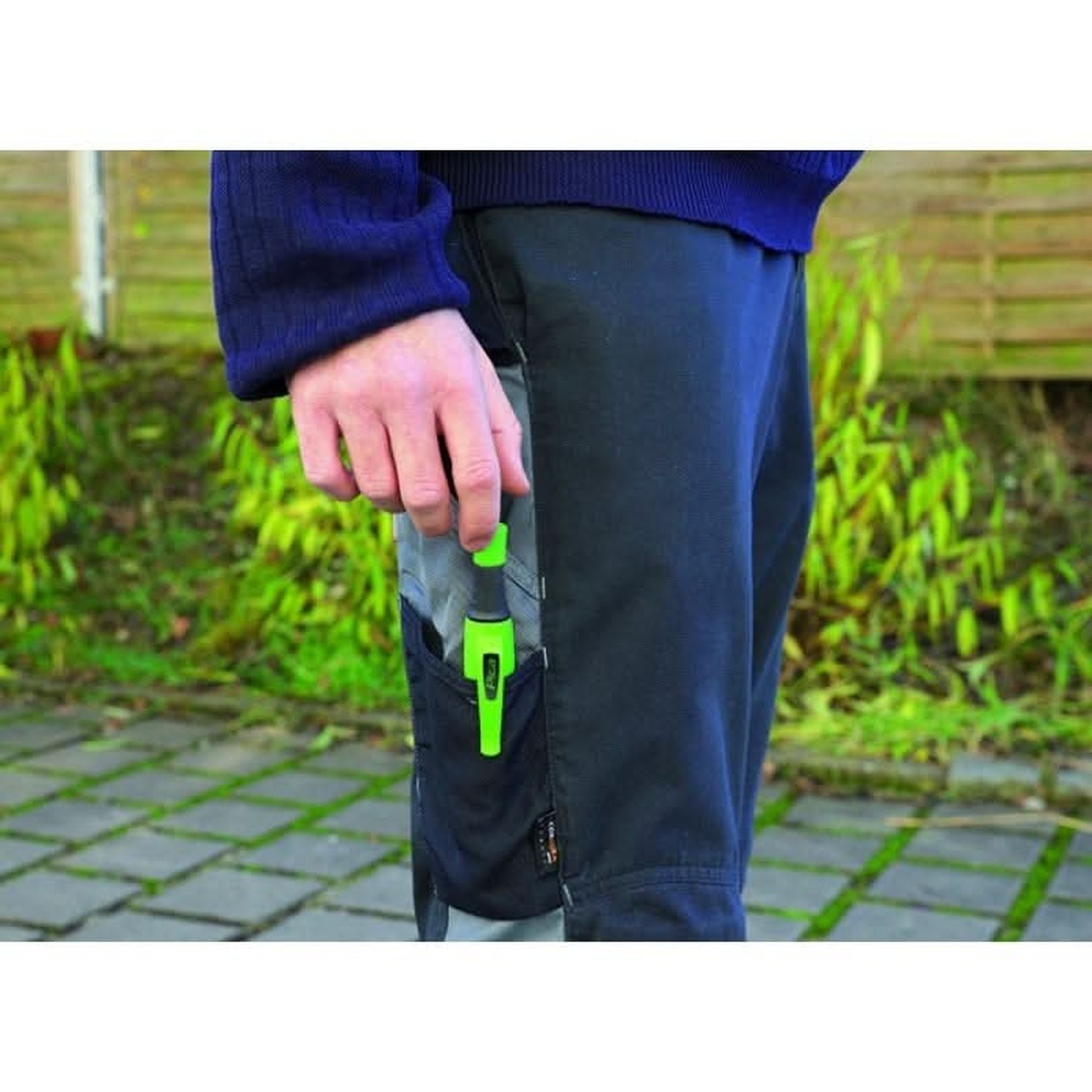 Pica BIG Dry 6060 Longlife Construction Marker clipped into a work pant pocket for quick one-handed access on the jobsite