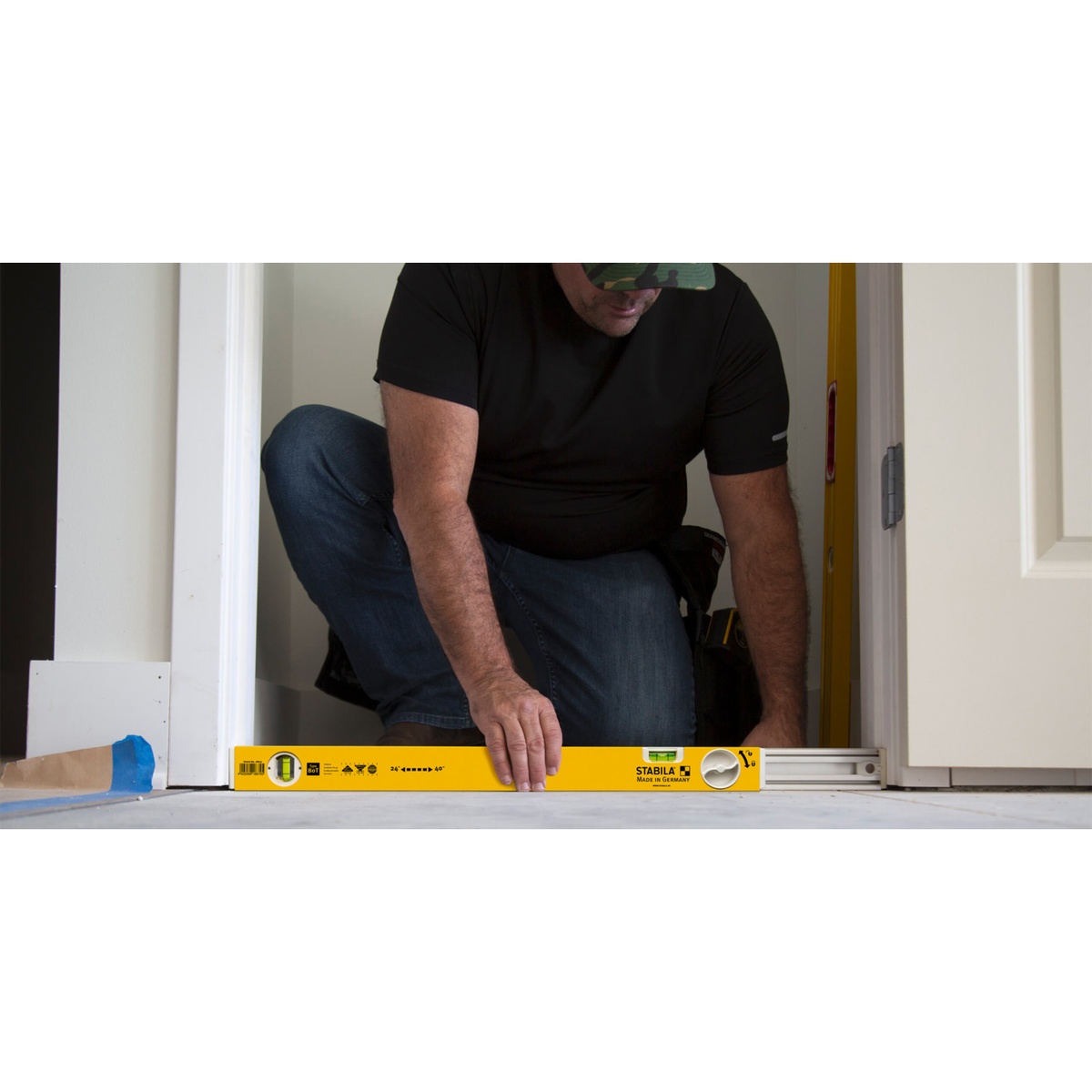 Stabila 29459 80T Adjustable Length Level, 36 to 59 inch, collapsed for checking level across a doorway during trim and finish carpentry work