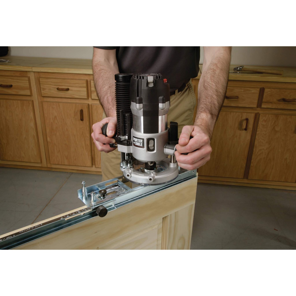 Porter Cable 59381 Hinge Butt Template Kit guiding a router on a wood door while cutting hinge gains during door installation