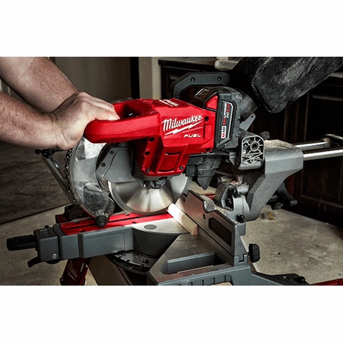 Milwaukee 2733-21 M18 FUEL 7-1/4 Dual Bevel Sliding Compound Miter Saw Kit making a cut on interior trim material with the shadow cut line visible