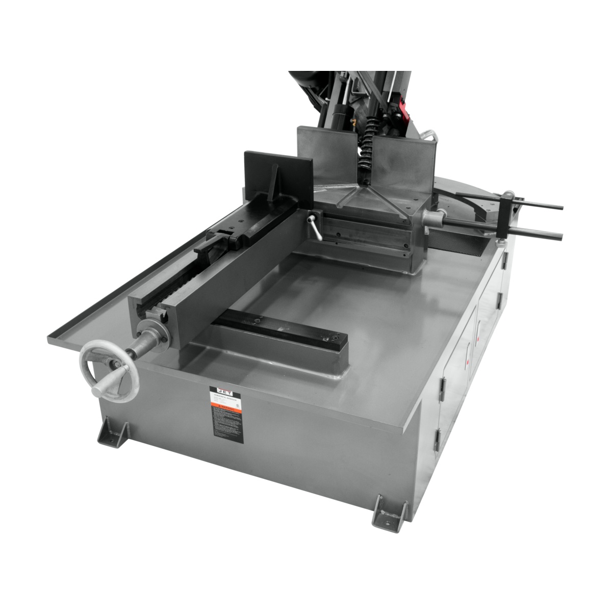 JET horizontal dual mitering bandsaw vise and work support area set up to hold metal stock securely for repeat cuts in a fabrication shop