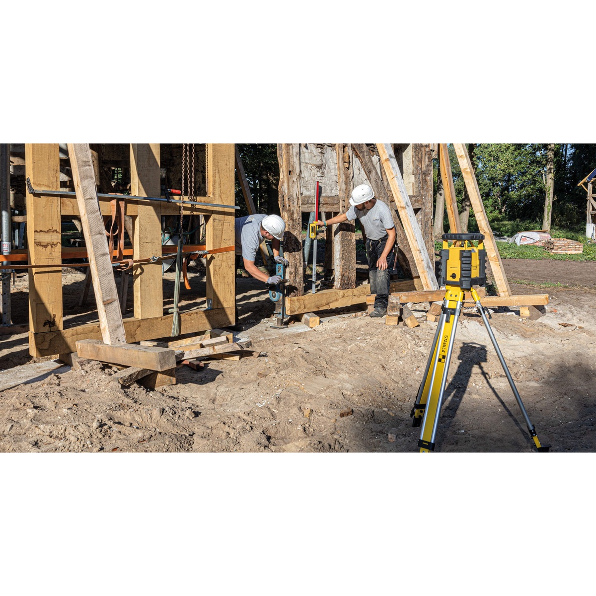 Stabila 07150 AE-LAR350 Li-ion rechargeable battery unit power source for a STABILA LAR 350 rotary laser on a tripod during jobsite layout and leveling
