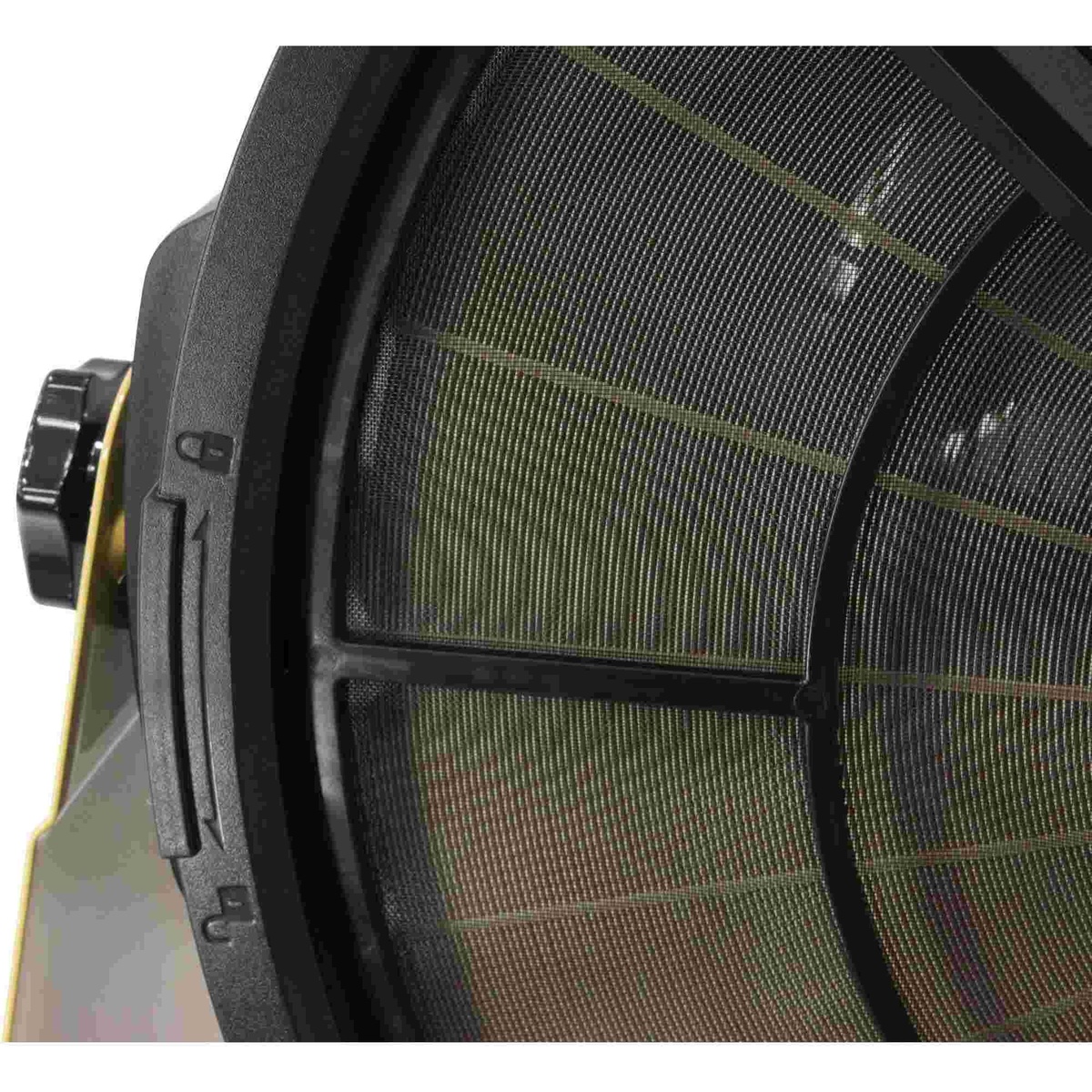 Close-up of the Powermatic PM1250 electrostatic filter screen showing the accessible filter surface for cleaning and long service life in a woodworking shop