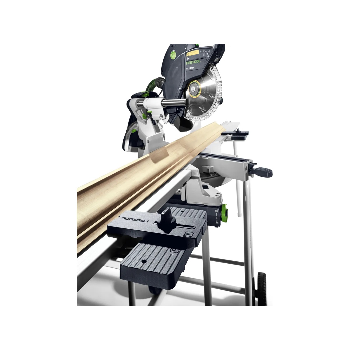 Festool Crown Stops AB-KA-UG/2 installed on a Kapex miter saw extension supporting nested crown molding during trim cutting