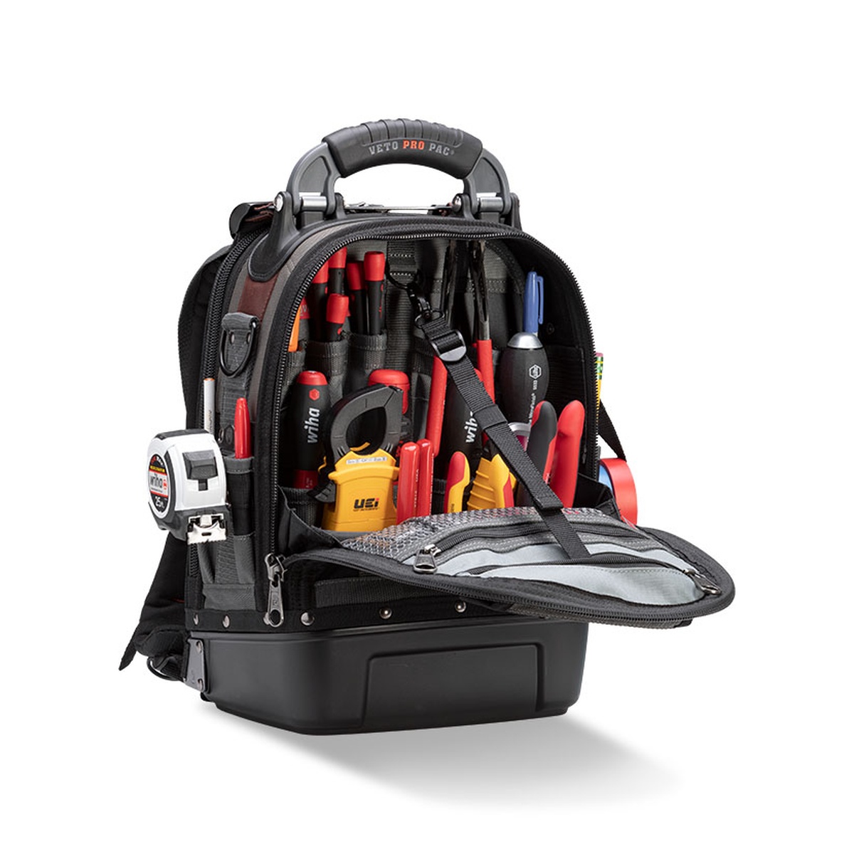 Veto Pro Pac Tech Pac MC Backpack Tool Bag opened to show organized hand tools and meter storage for electrical and service work in a compact field bag