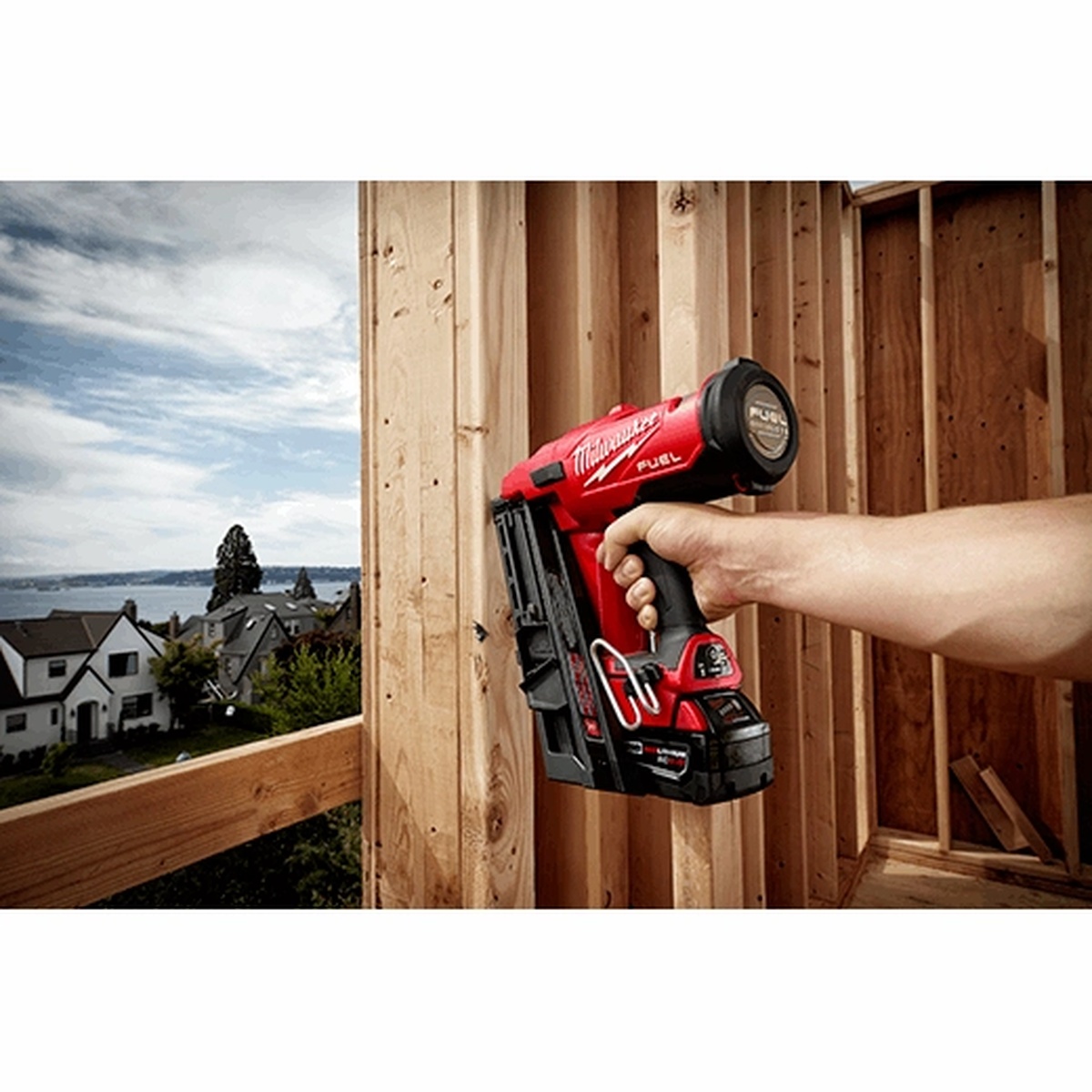 Milwaukee 2745-21 M18 FUEL 30 Degree Framing Nailer Kit used inside a framed wall cavity for vertical fastening work