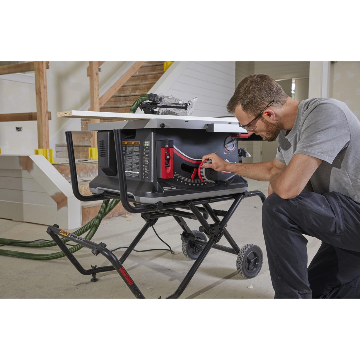 SawStop Jobsite Saw Pro table saw top view showing onboard storage drawer, table surface, and accessory organization on an outdoor worksite