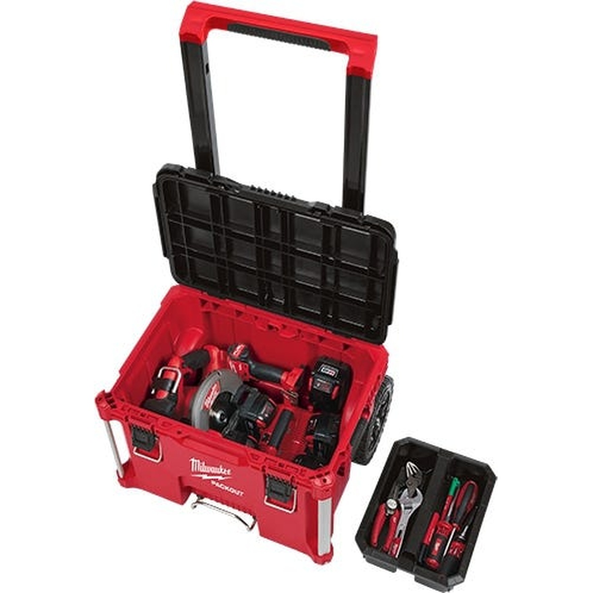 Milwaukee PACKOUT rolling tool box open with cordless tools stored inside and organizer tray removed for access in a workshop setting
