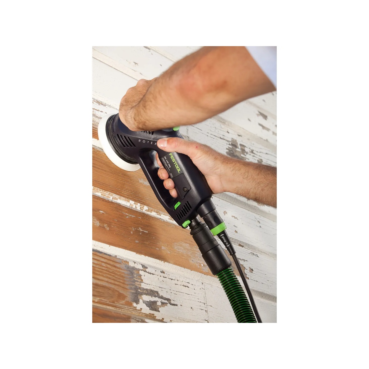 Festool 576032 RO 125 FEQ-Plus Rotex 125mm 5 inch multi-mode sander stripping painted wood siding with dust extraction hose attached during surface prep
