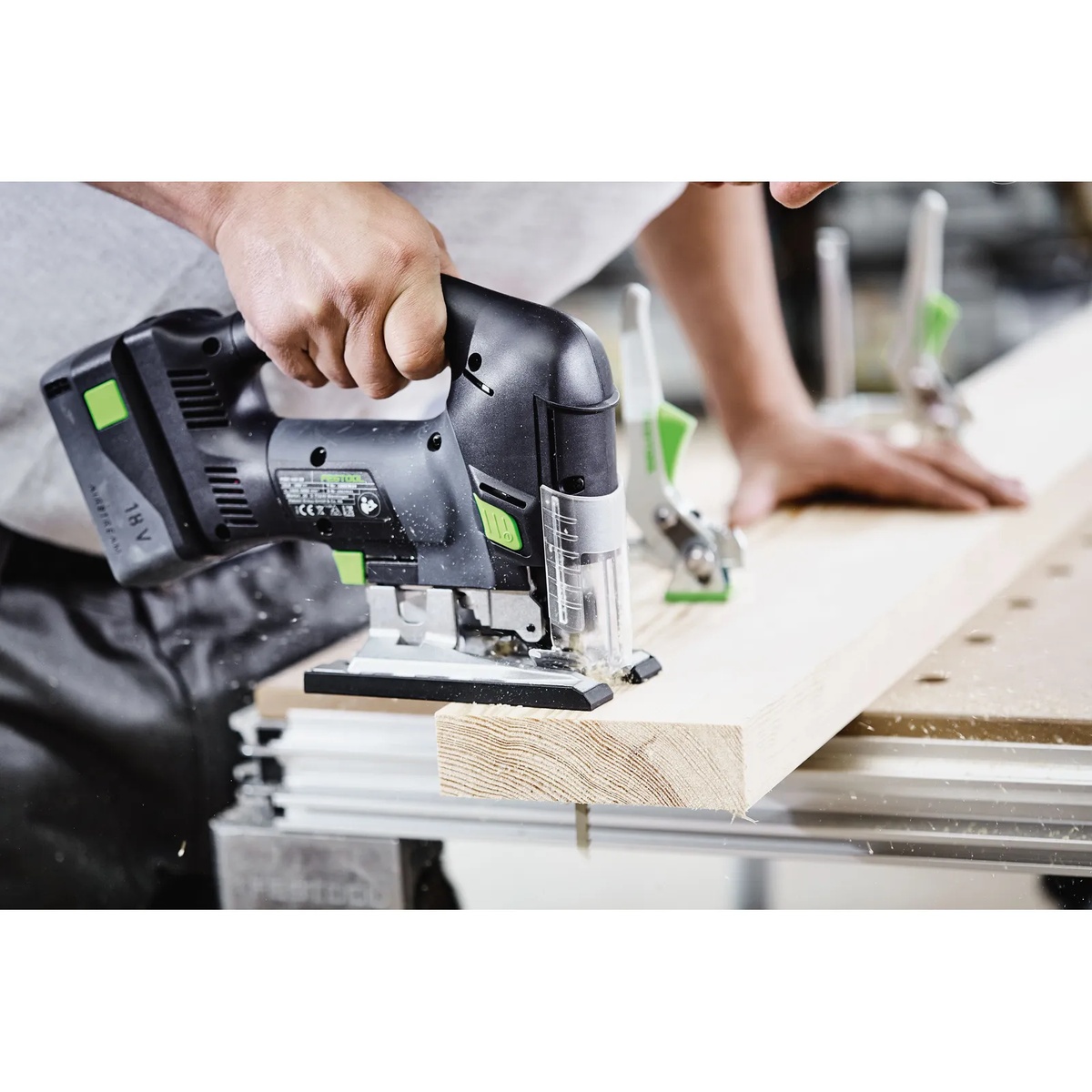 Festool Cordless Carvex Jigsaw PSBC 420 EB-Basic cutting a wood board on a workbench during finish carpentry work