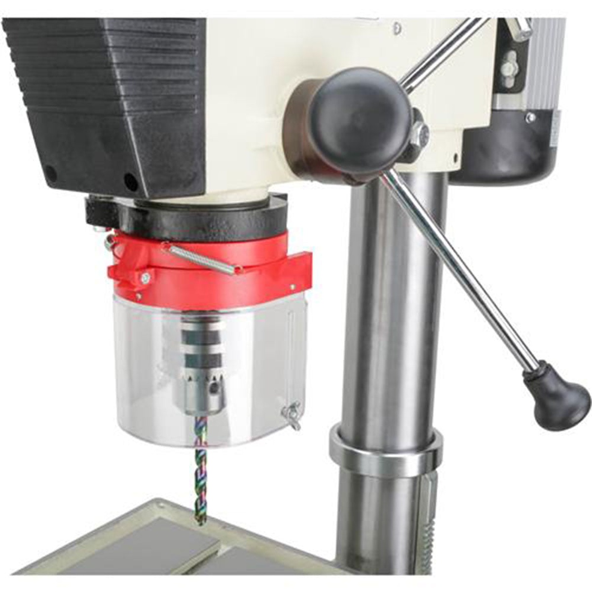 Close-up of the Shop Fox M1039 20 inch Professional Grade Floor Drill Press spindle area showing the chuck, quill feed handles, and clear safety guard above the table