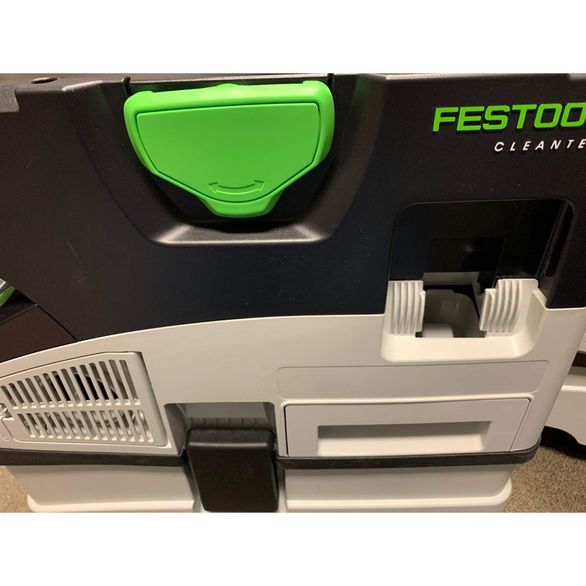 Festool Hose Garage for Bluetooth CT MINI I MIDI I CT 15 Dust Extractors installed on a Festool Cleantec dust extractor showing the front latch and body interface