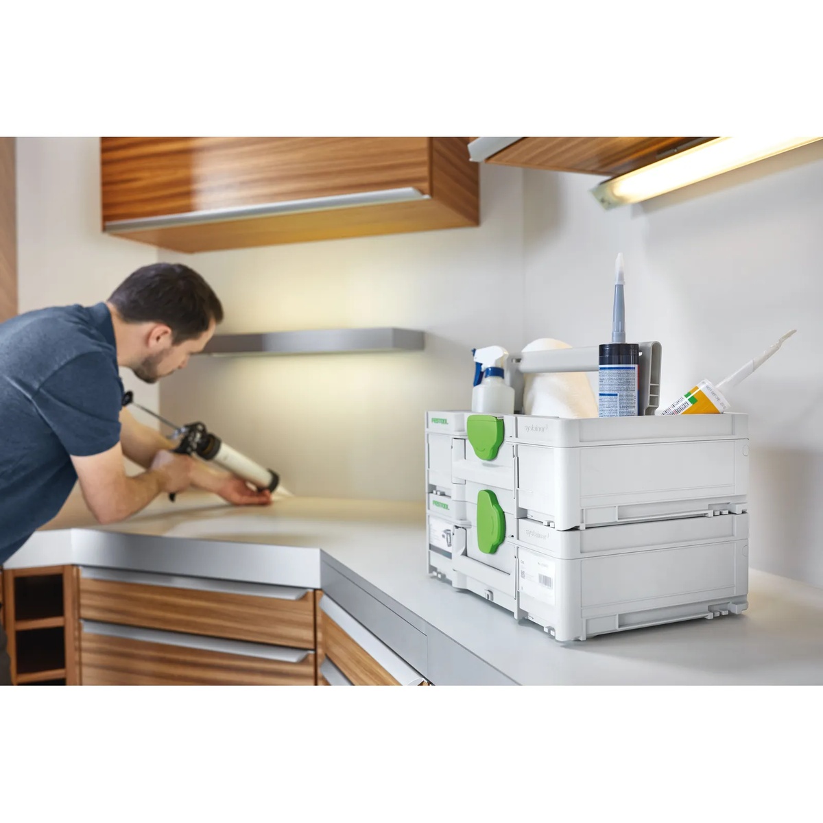Festool 204866 Systainer3 Open Top ToolBox M 237 stacked on other Systainers on a kitchen installation counter with sealants and supplies