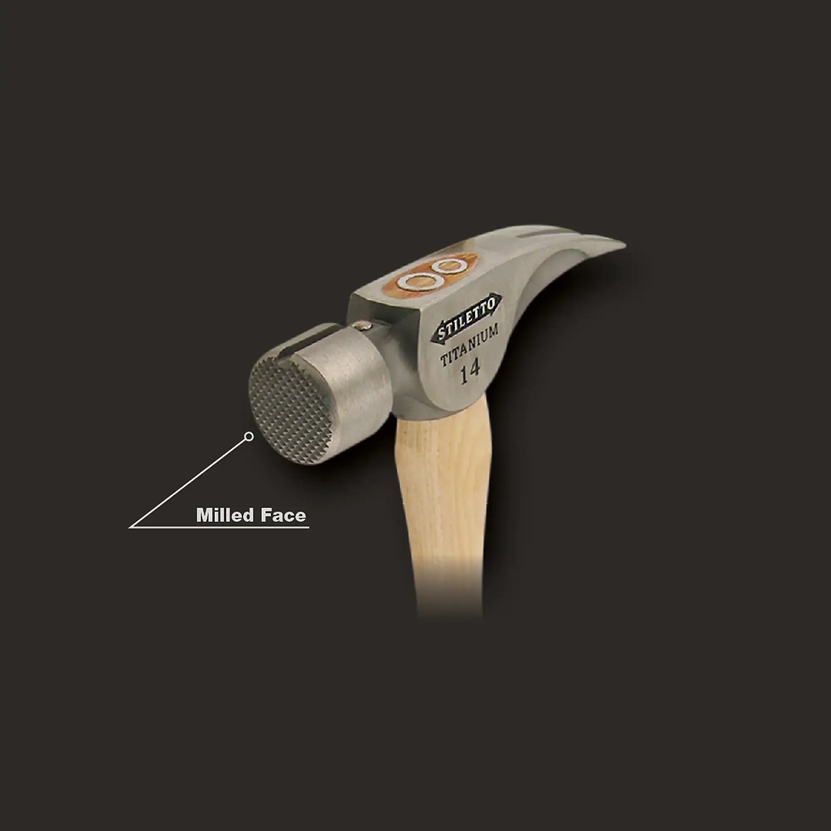 Close-up of the Stiletto TI14MS 14 oz Titanium Milled Face Hammer head showing the milled striking face used for framing nail grip on a jobsite
