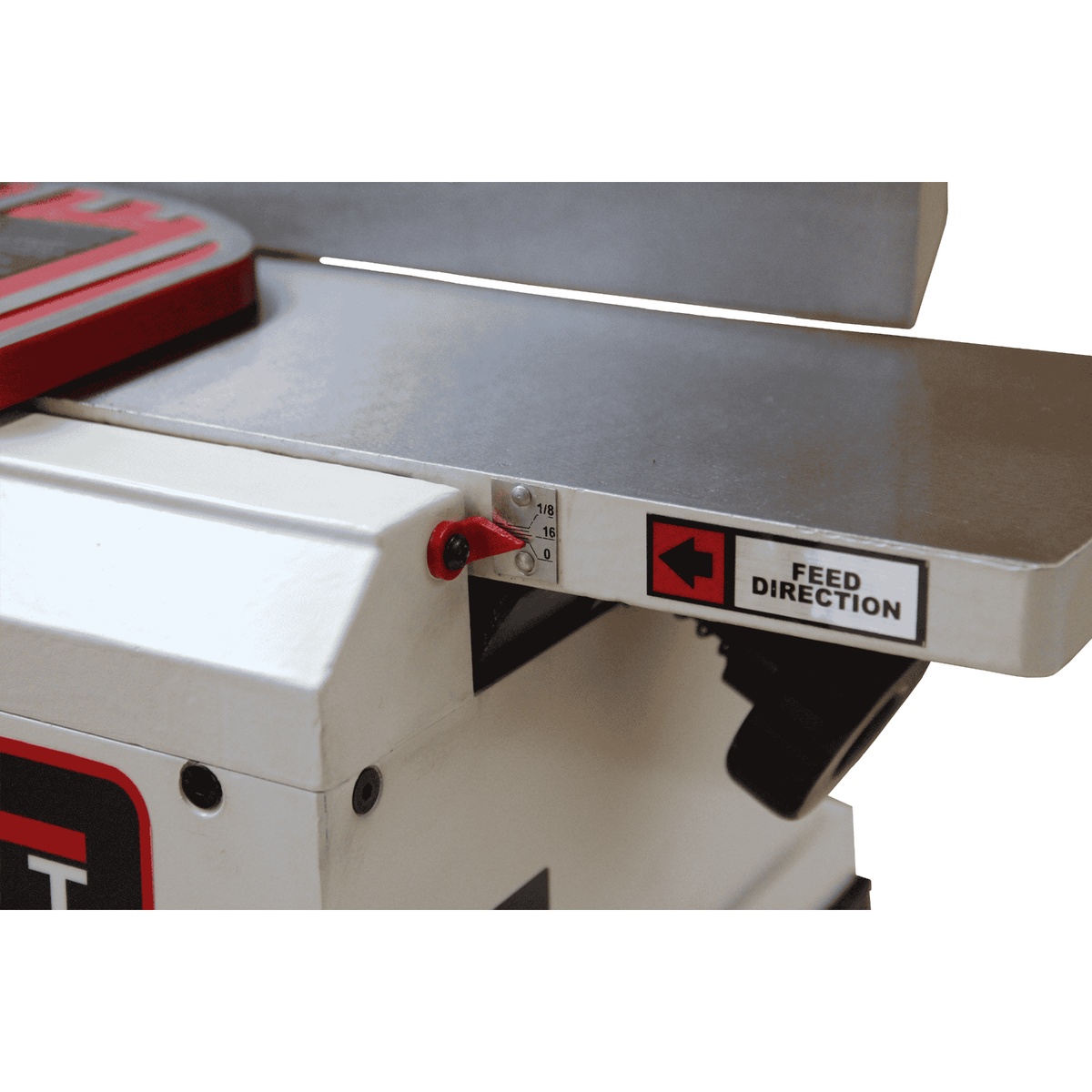 JET 718600 JJ-6HHBT, 6-Inch Helical Head Benchtop Jointer close-up of the depth-of-cut scale and feed direction marking for accurate woodworking setup