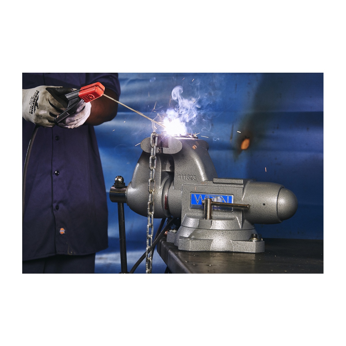 Wilton 28806 Tradesman 1755 Vise holding chain during welding on a metal shop bench