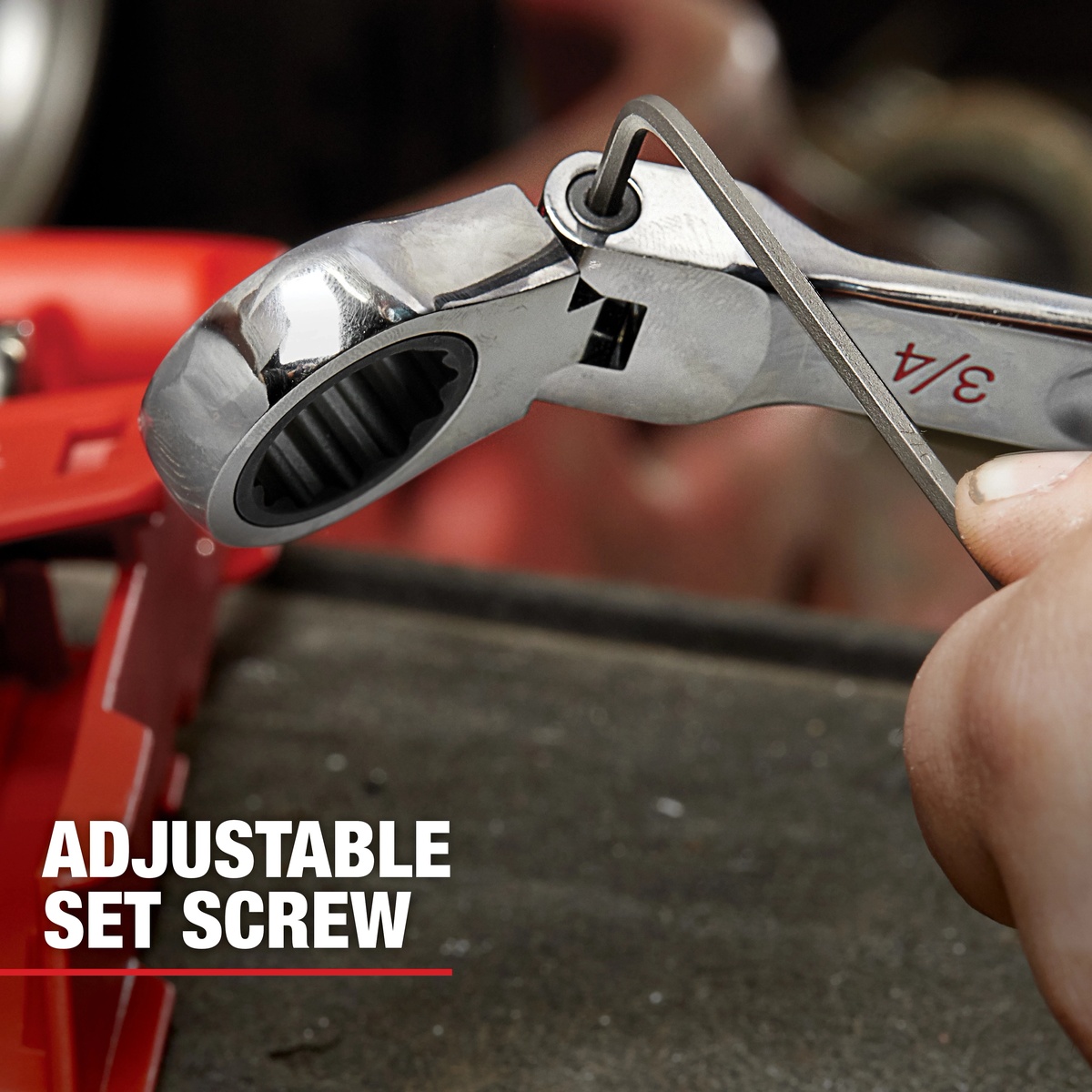 Milwaukee 48-22-9513 Metric Flex Head Ratcheting Combination Wrench, 15-Pieces close-up showing the adjustable set screw on the flex head during shop setup