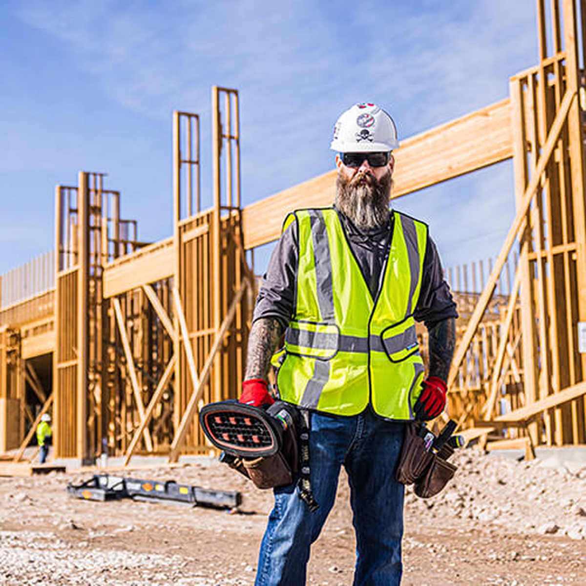 Grabo GP-1Li-FB Pro-Lifter 20 Vacuum Lift System Kit carried by a worker on a framing jobsite
