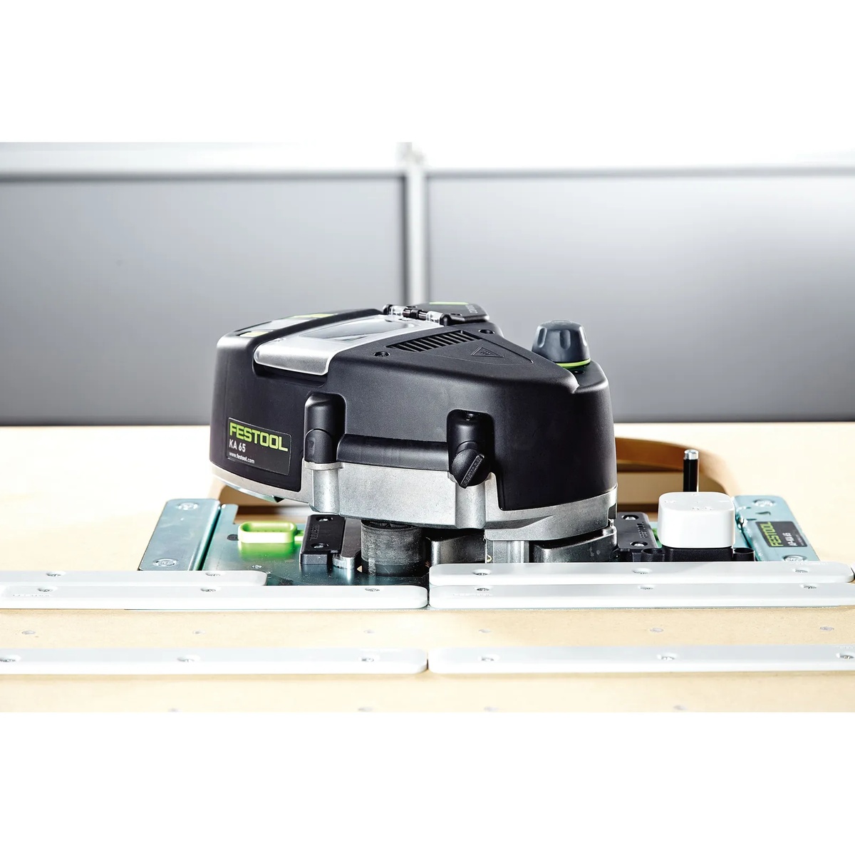 Festool Conturo KA 65 Hand Held Edge Bander mounted in an edge banding station for controlled work on small panels and beveled parts