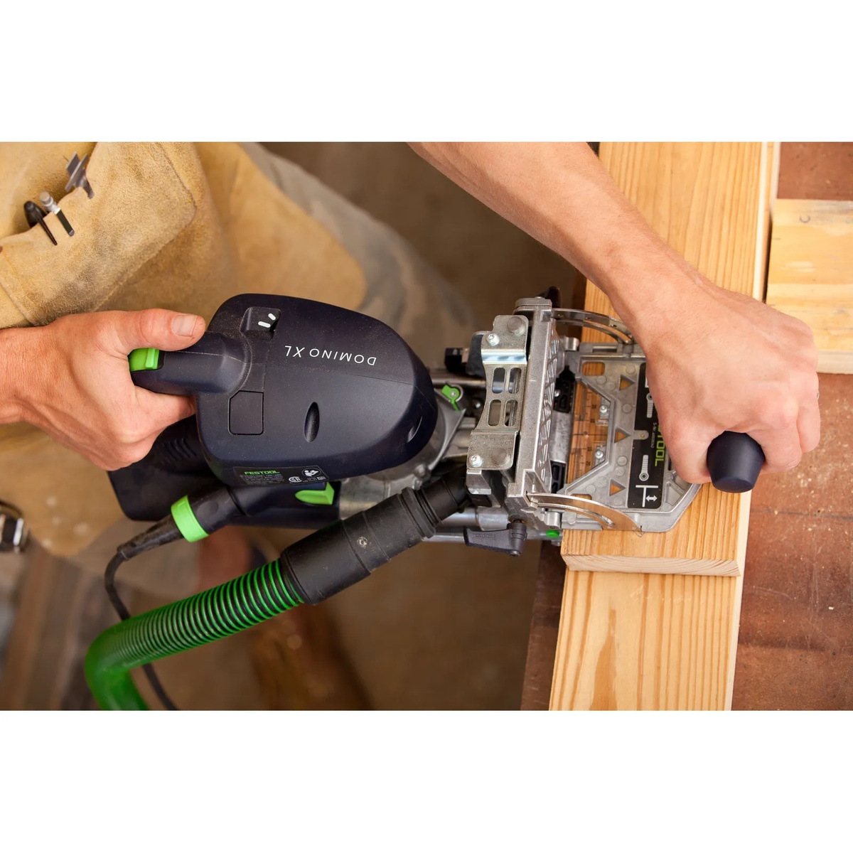 Festool DF 700 EQ-Set DOMINO Joiner XL cutting a mortise into thick framing stock during heavy furniture assembly
