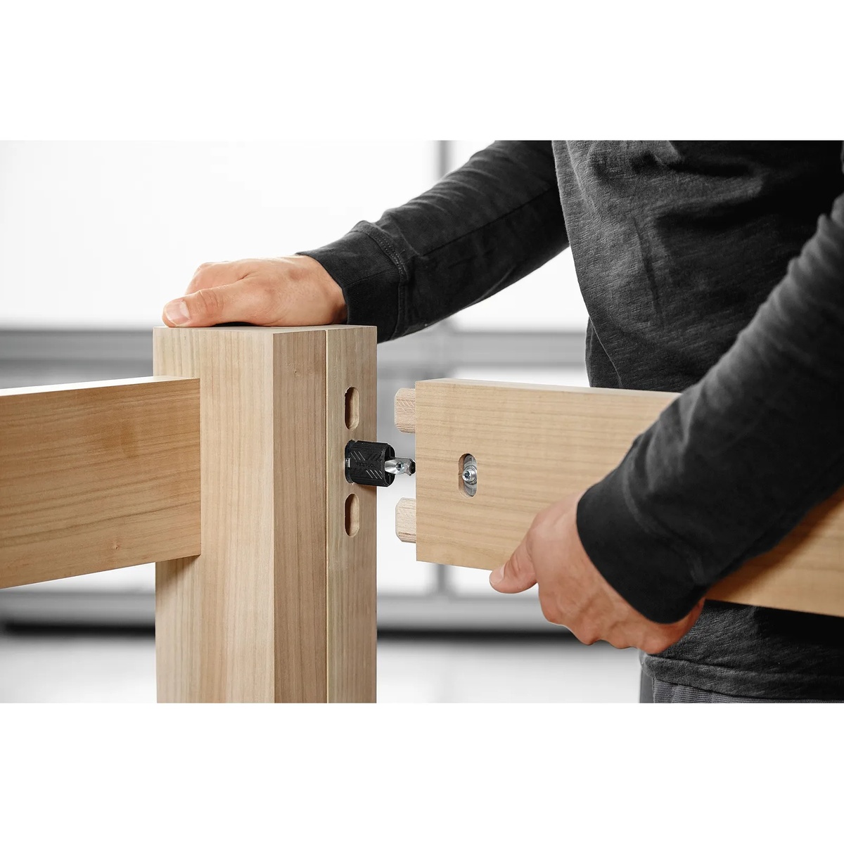 Festool 576795 Domino Connectors D14 for Domino XL joining a large wood frame during furniture assembly in a workshop