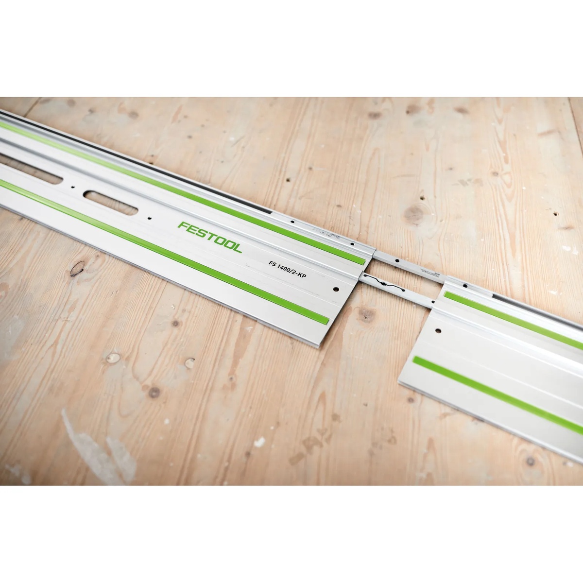 Festool FSV/2 Guide Rail Connector 2-Pack connecting two Festool rails on a wood work surface for sheet goods cutting