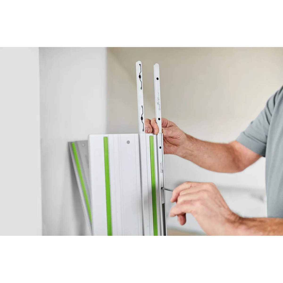 Festool 577157 Guide Rail Accessory Kit w/ Systainer3 guide rail connectors being installed into FS/2 rails with a hex key for alignment