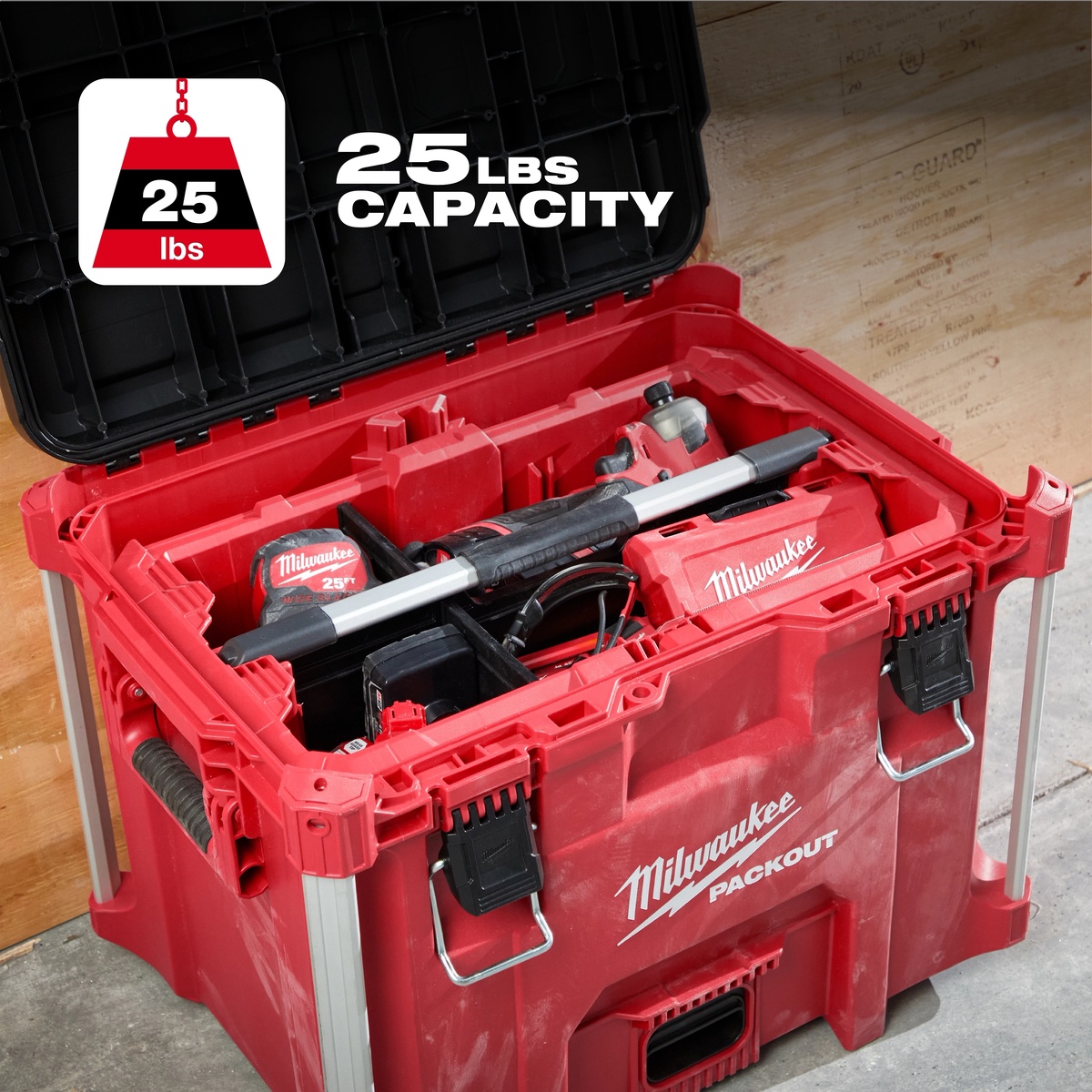 Milwaukee 48-22-8045 PACKOUT Tool Tray loaded with tools inside a PACKOUT box, showing 25 pound capacity for jobsite storage and transport