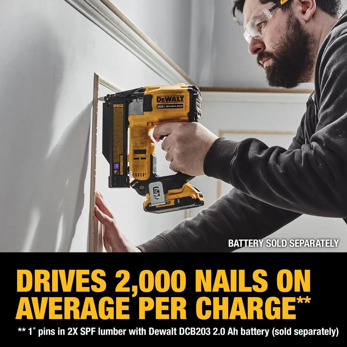 DEWALT 20V MAX ATOMIC Compact Series Brushless Cordless 23 Gauge Pin Nailer fastening interior trim on a wall during finish carpentry work