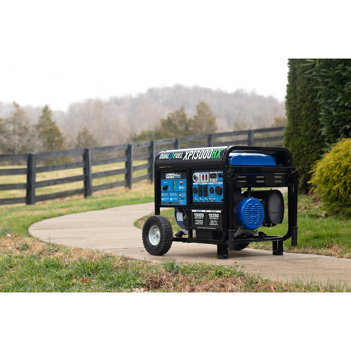 DuroMax XP13000HX 13,000-Watt Dual Fuel Portable Generator set up outdoors on a residential driveway for emergency home backup power