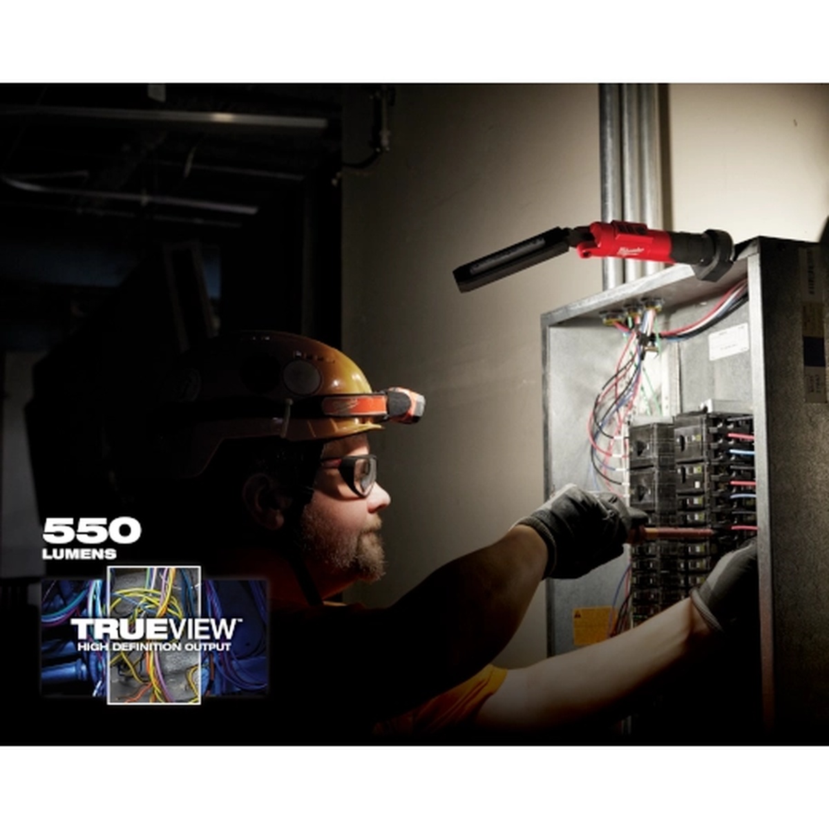 Milwaukee 2128-21 REDLITHIUM USB Stick Light w/ Magnet mounted on an electrical panel while lighting wiring work during service and inspection