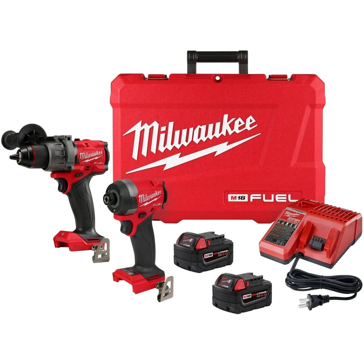 Milwaukee 3697-22 M18 FUEL Gen4 hammer drill and impact driver shown with charger, batteries, and carrying case to highlight compact cordless drilling and fastening tools for cabinets, framing, and service work