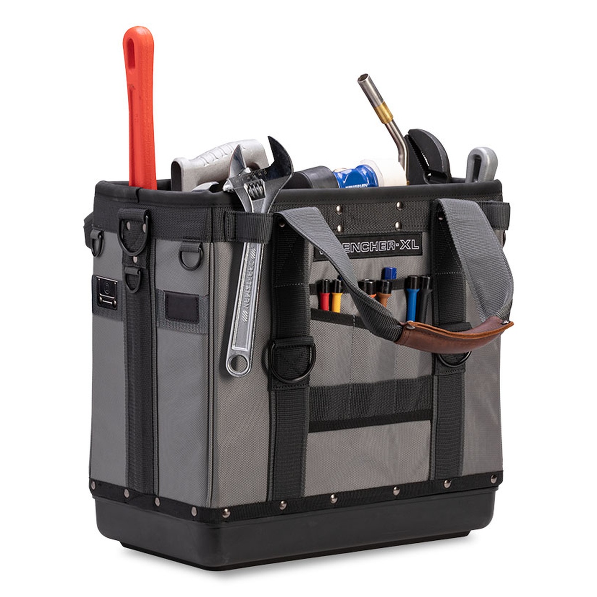 Veto Pro Pac WRENCHER-XL open top plumbing bag loaded with pipe wrench, adjustable wrench, and plumbing tools in a shop or service-ready setup