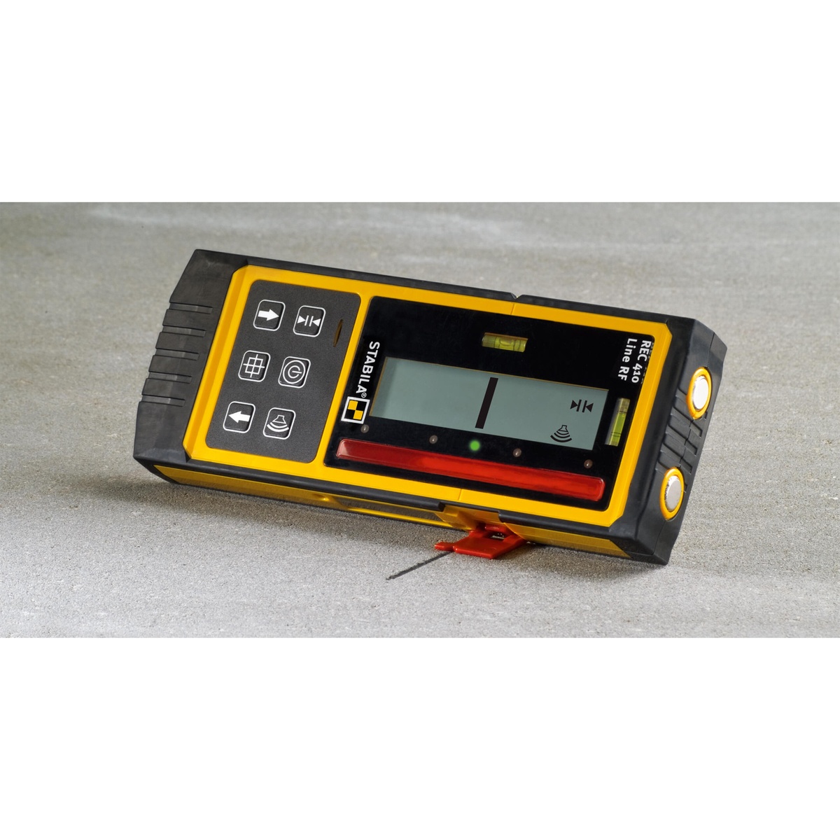 Stabila REC 410 Line RF Receiver for LA180L resting on a concrete surface showing rugged casing and controls