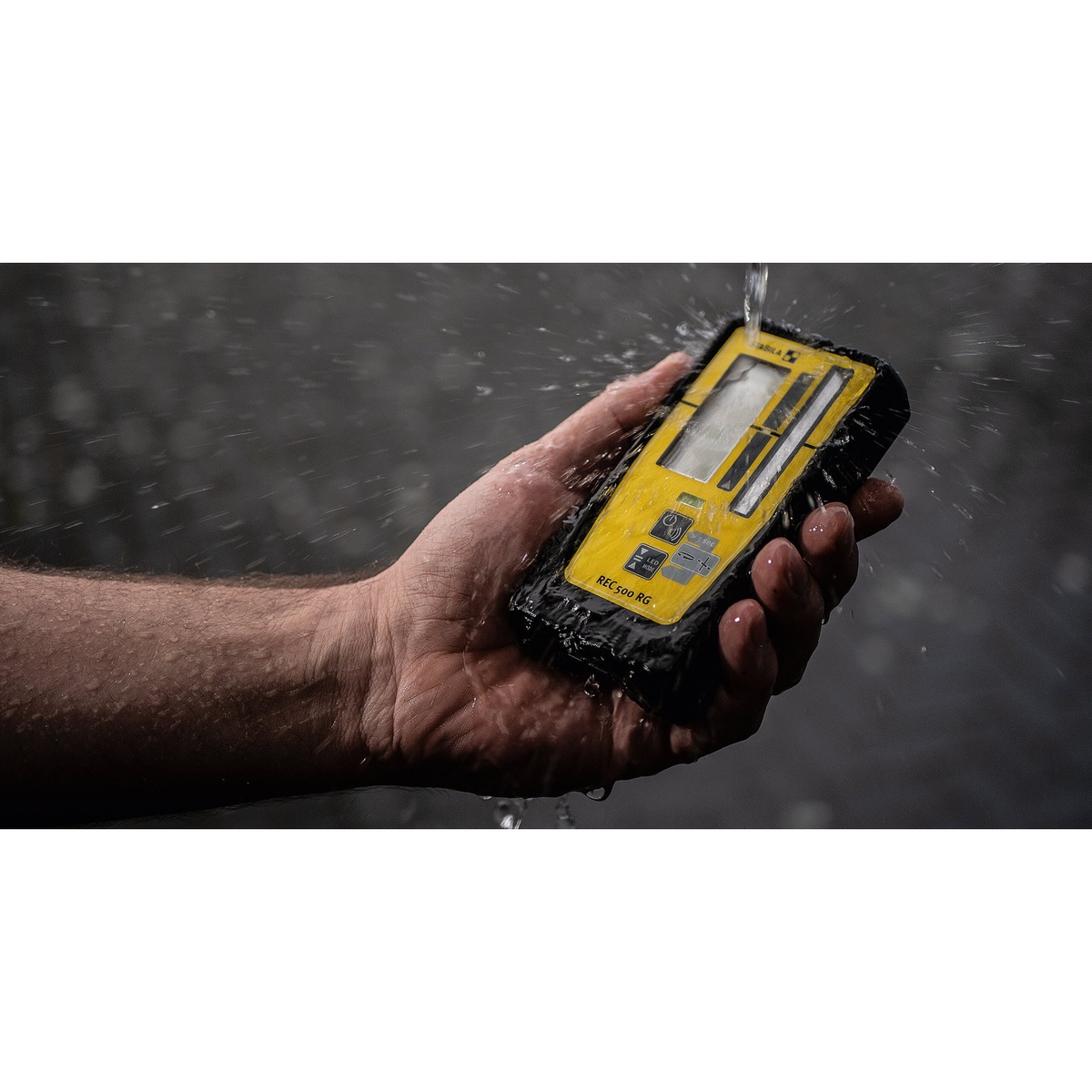 Stabila REC 500 RG Universal Rotary and Line Laser Receiver exposed to heavy water during jobsite durability testing