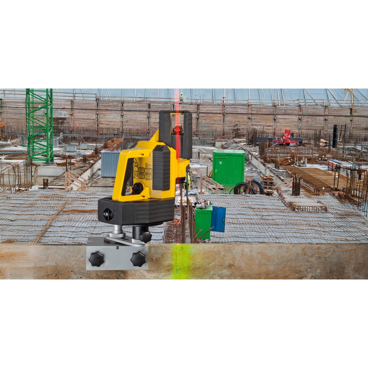 Stabila 07410 Laser Mount for Batter Boards and Forms holding a rotary laser on a form board at an active construction layout site