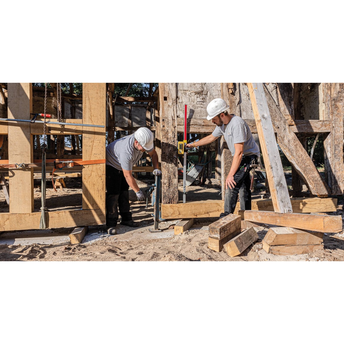 Stabila 07469 Hi-Lo Elevation Rod used with a laser receiver during timber framing work to verify height and grade near posts and beams