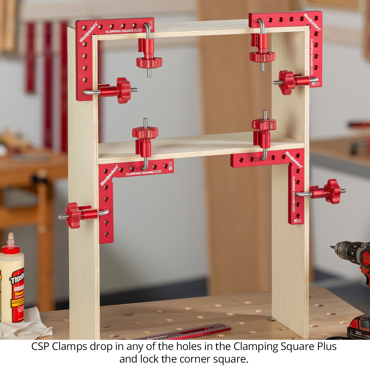 Woodpeckers CSPC2 CSP Clamps locking into Clamping Square Plus holes to hold a cabinet corner square during assembly