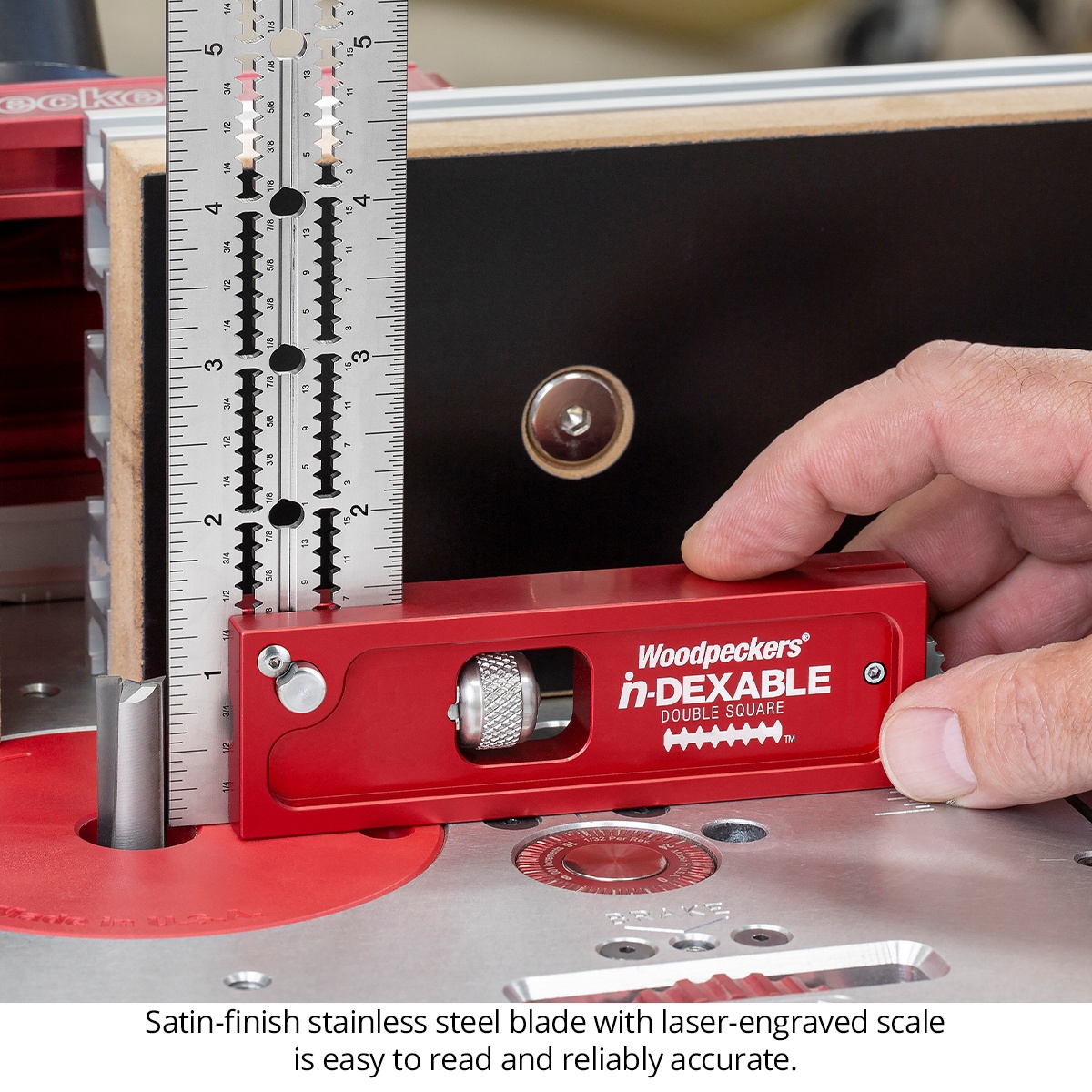 Woodpeckers in-DEXABLE Double Square Standard set on a router table showing the satin-finish stainless steel blade and laser-engraved scale during setup work