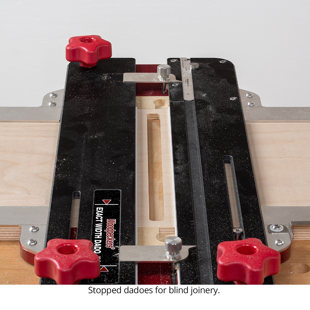 Woodpeckers EWDJ-32-20 Exact Width Dado Jig cutting a stopped dado in plywood for blind joinery on a woodworking bench
