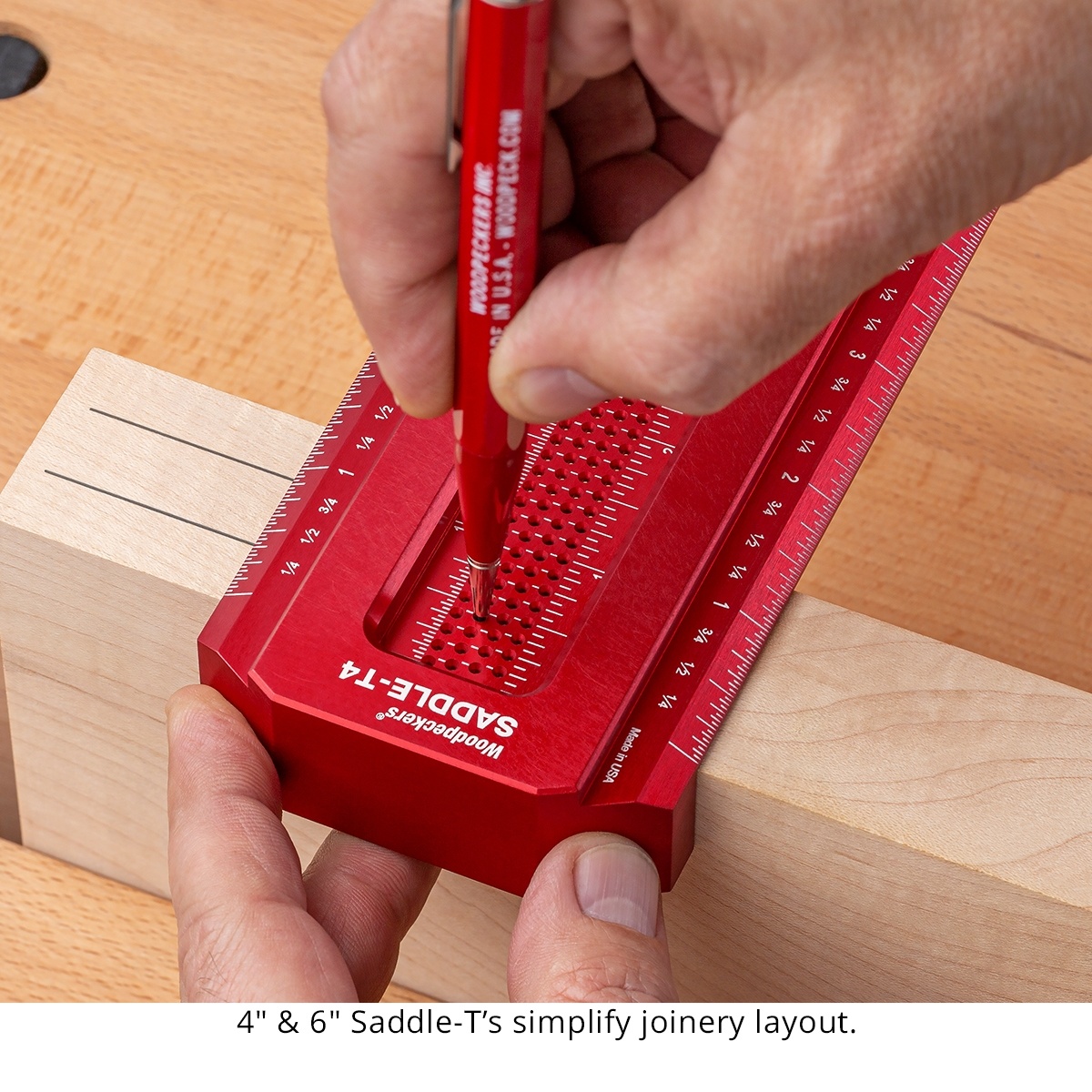 Woodpeckers Saddle-T6 T-Square marking joinery layout lines across a wood workpiece at a woodworking bench